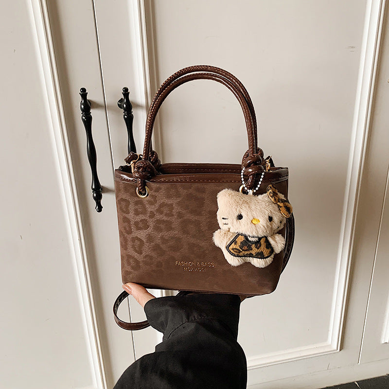 Chic Vintage Bucket Bag with Plush Charm for Women, Perfect for Daily Wear and Fashionable Outfits