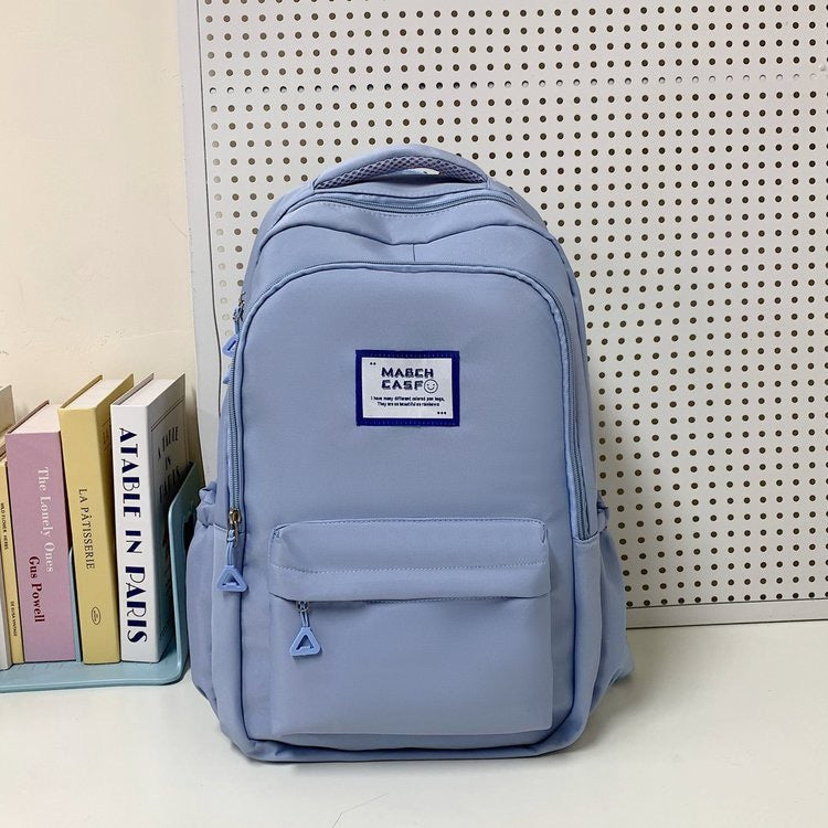 Minimalist High-Capacity Backpack for Students and Daily Use with Fashionable Letter Design