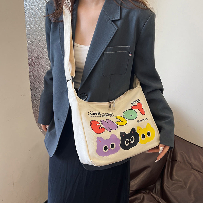 Cute Cartoon Cat Print Canvas Tote Bag with Colorful 'ENJOY' Lettering and Zipper Closure for Daily Use