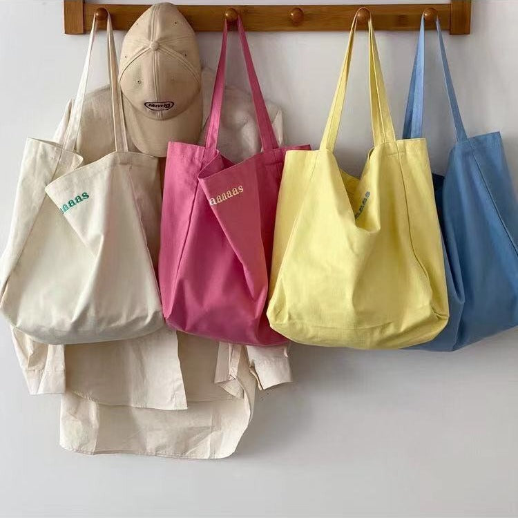 Cute Candy Color Canvas Tote Bag with Letter Print and Fluffy Charm for Daily Use and School