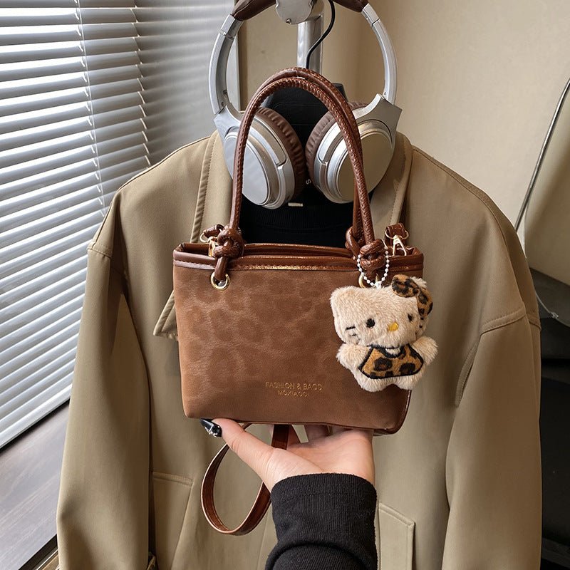 Chic Vintage Bucket Bag with Plush Charm for Women, Perfect for Daily Wear and Fashionable Outfits