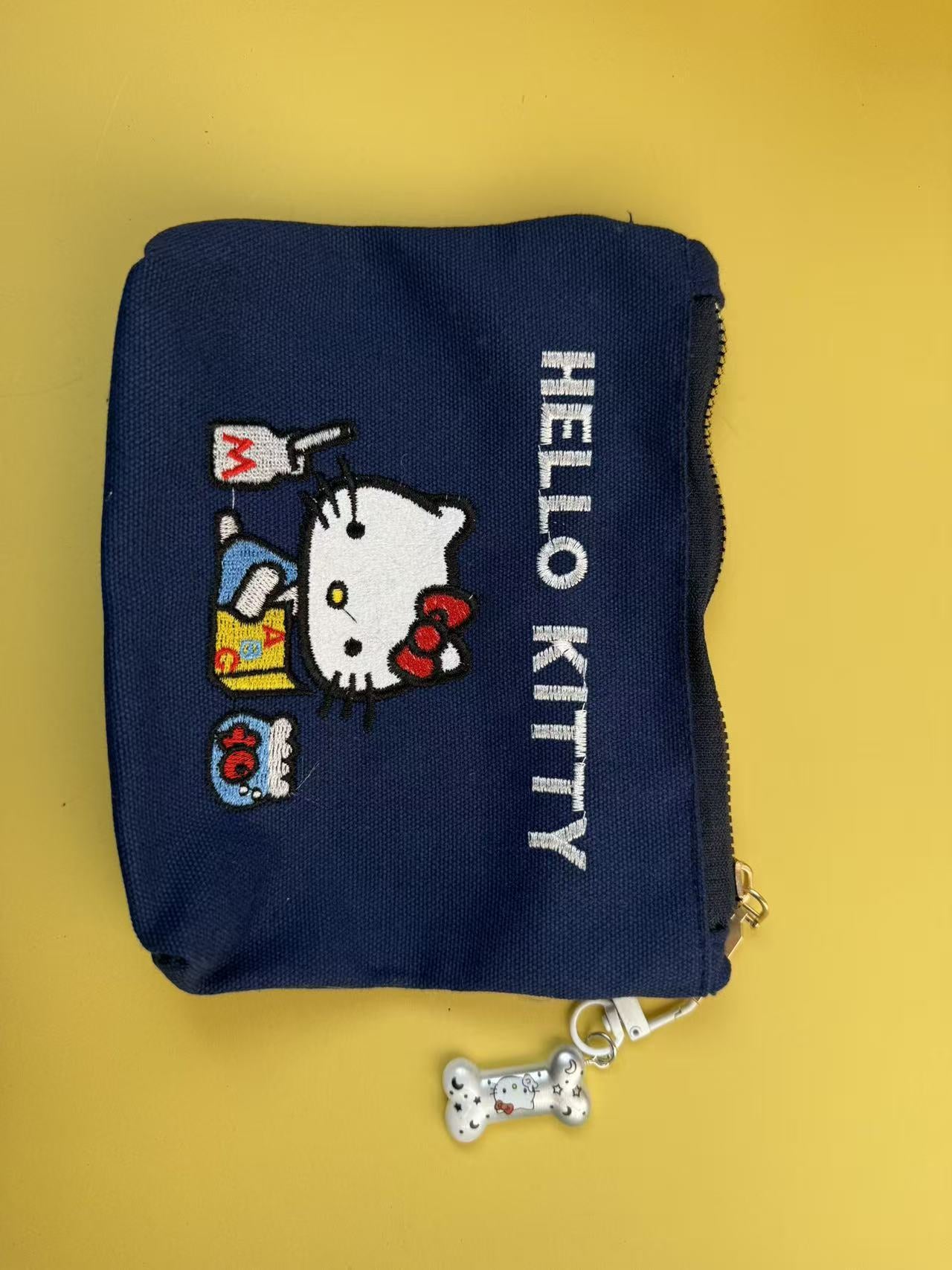 Sanrio Cat Embroidered Canvas Women's Storage Bag with Bones Pendant Zipper Cute Cartoon Design Daily Practical